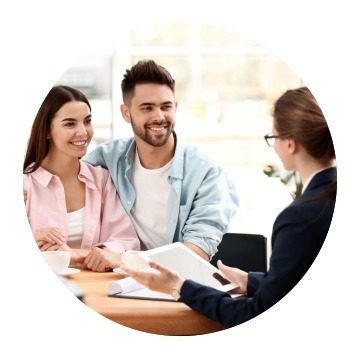 Couple consulting with a professional advisor.
